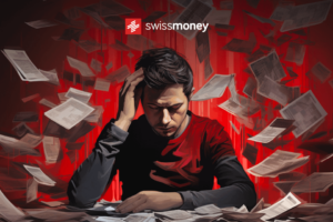 A stressed person surrounded by bills